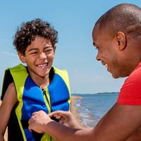 A father and son at the beach.