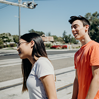 Misconceptions Railroaders Two teens look out towards a railroad track.