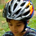 Boy in a properly fitting bike helmet