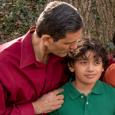 Father and son meet at their fire drill safe spot outside the house