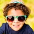 Kid in glasses and hat ready to enjoy summer