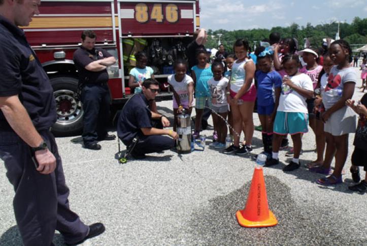 The Prince George&#039;s Fire Department teaching kids to use a fire extingusher.