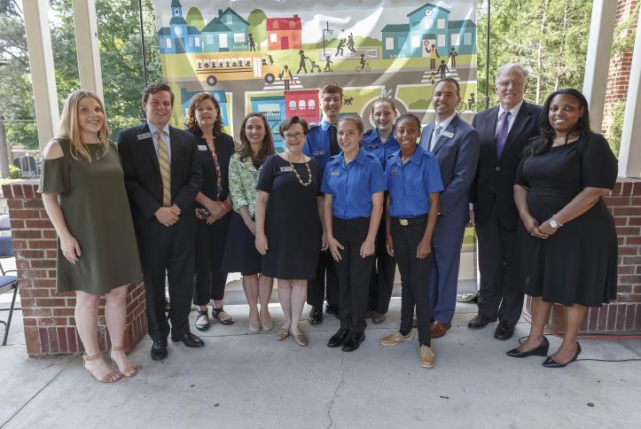 The staff and administration of Atlanta Public Schools for the afe School Zone ribbon cutting at Inman Middle School