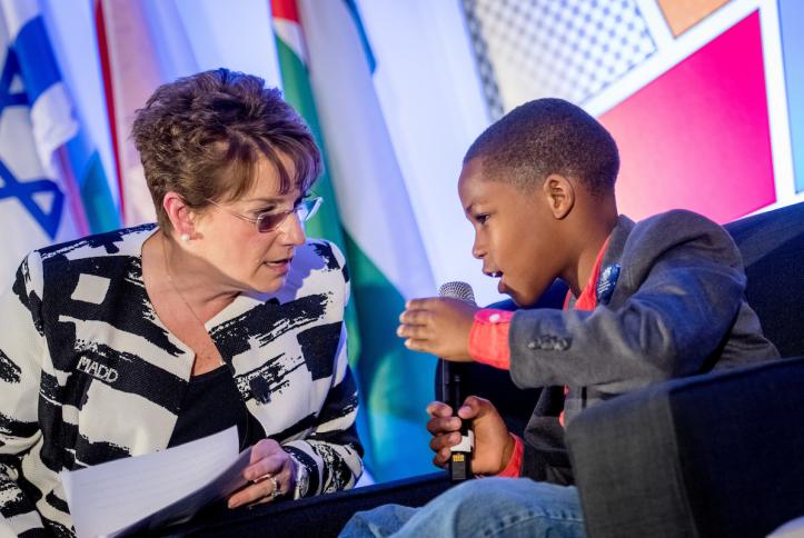 Young inventor Bishop Curry V participates in the Victim Advocates panel discussion.