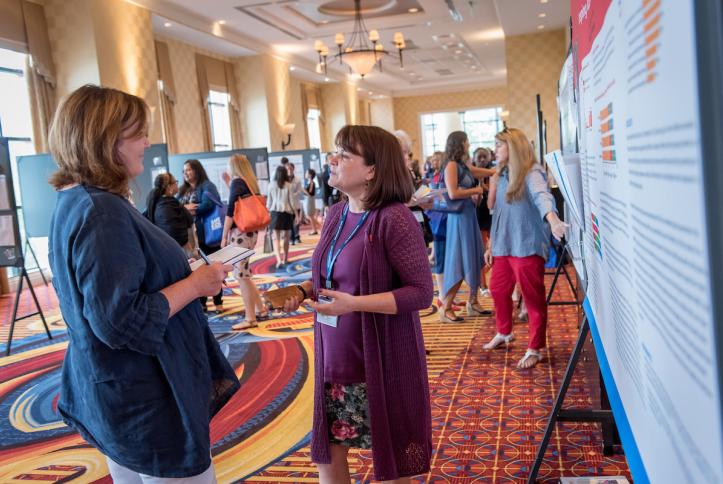 Injury prevention experts learn from each other during the Poster Dash.