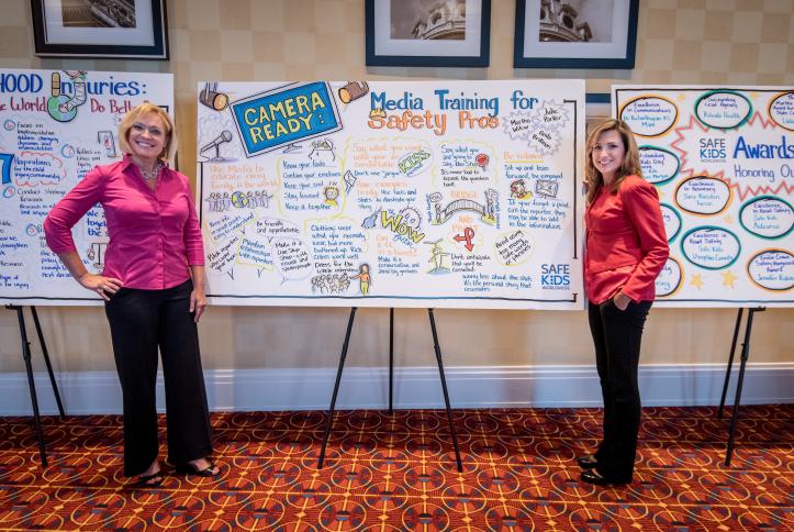 Anita Brikman &amp; Julie Parker admire the graphic notes from their session.