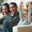 Family enjoys watching the Super Bowl on a properly secured TV